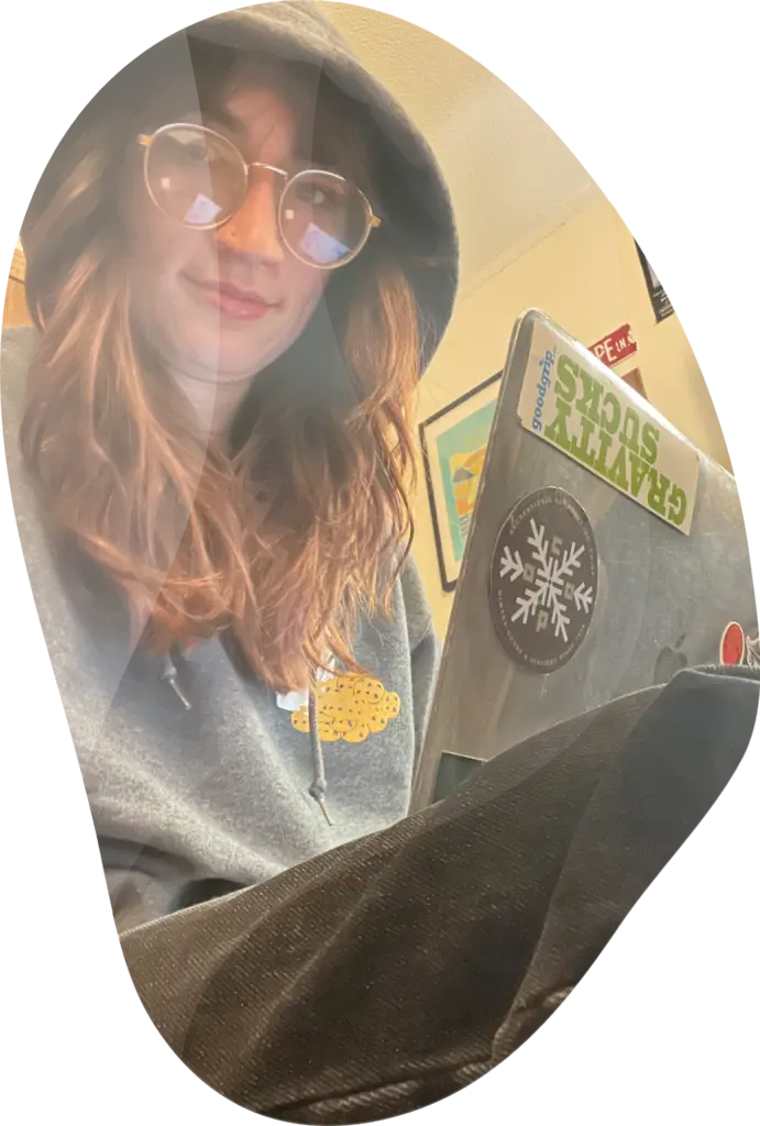 photo of erin bell on a computer